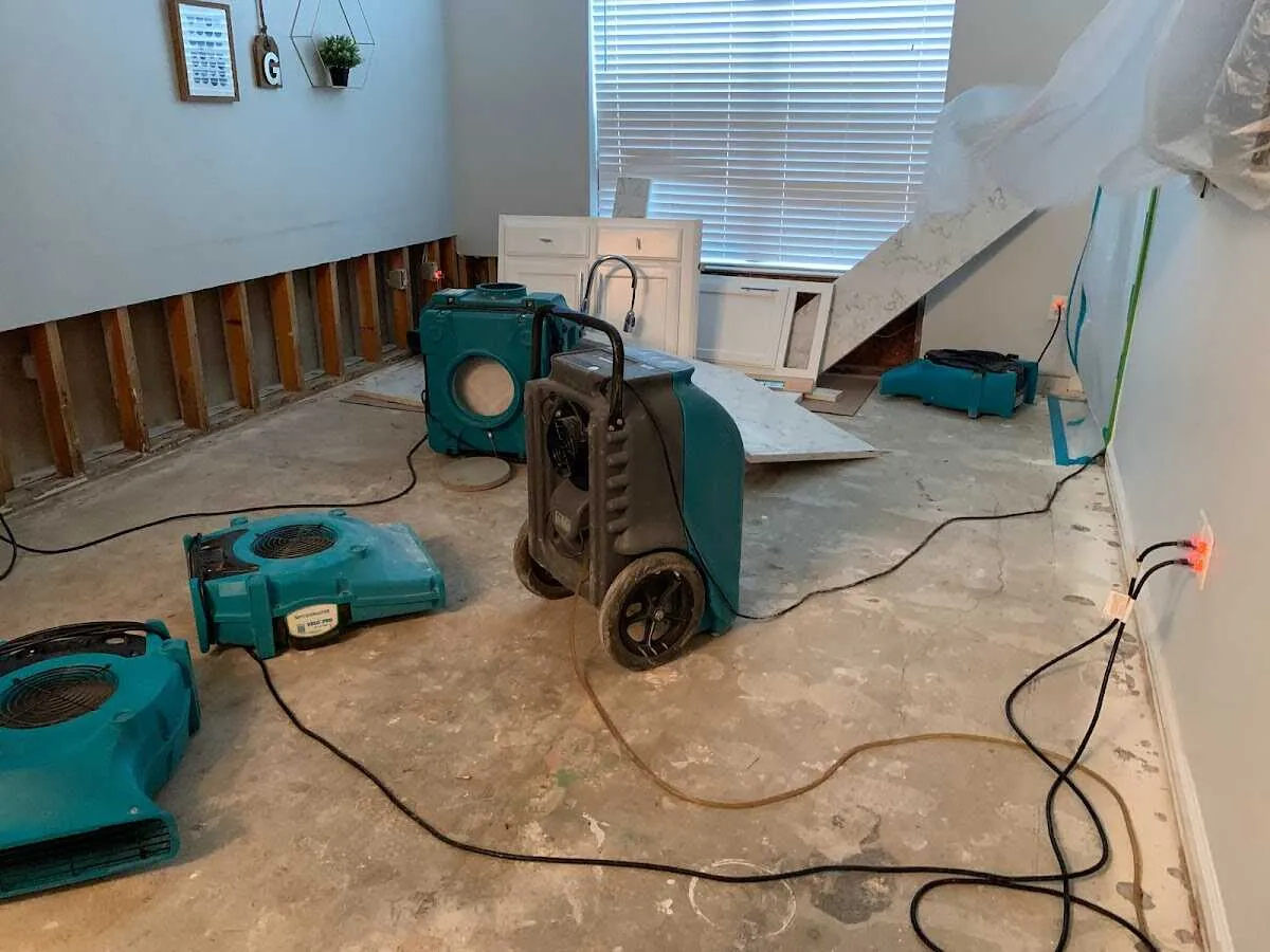 Dehumidifier in flood-cut room for Water Damage Restoration in Grandwood Park